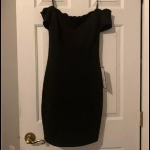 Black dress-juniors size 7/8. Brand new with tags.
